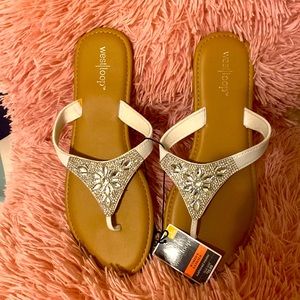 White rhinestones embedded flip flops. Size 10